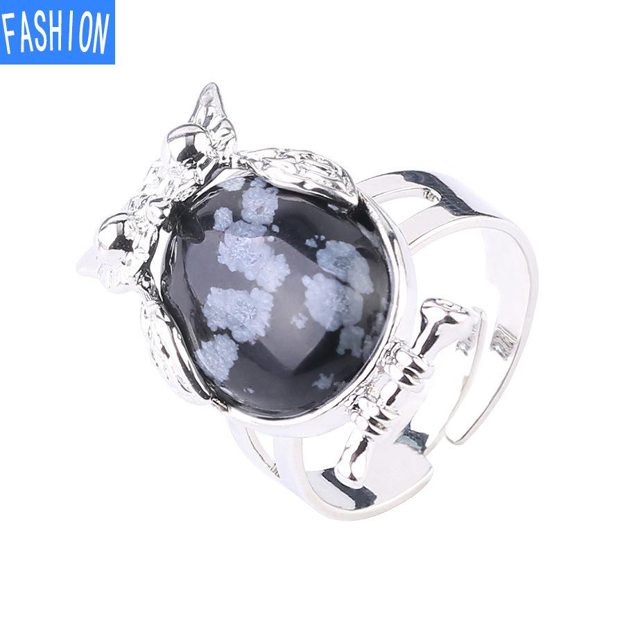 Металлическое регулируемое кольцо с выпуклым натуральным кристаллом в виде совы