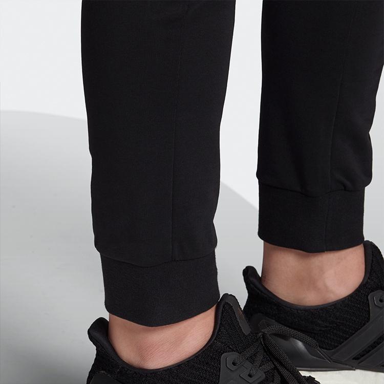 adidas Трикотажные спортивные штаны женские черные FS8991