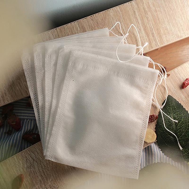 WCIC New 100pcs Disposable Tea Infuser Filter Bags Food Grade Non Woven Fabric Spice Filters With Rope Seal