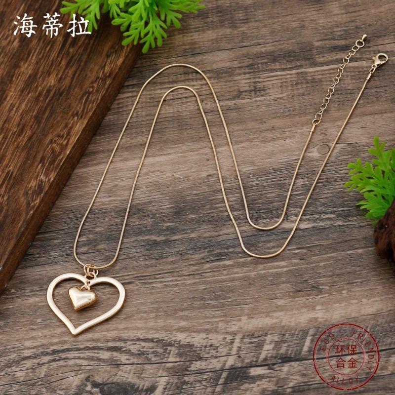 Новая глянцевая полая цепочка «змеиная кость» с подвеской в виде любви, женское простое и изысканное осенне-зимнее длинное ожерелье в форме сердца