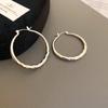 Silver Needle Style Circle Earrings - Simple Korean Metal Design, All-Match Earrings for a Celebrity Look.