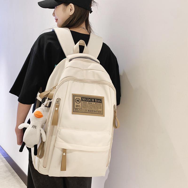Fashionable Water-Repellent Student Backpack: Trendy High-Capacity Design for Couples