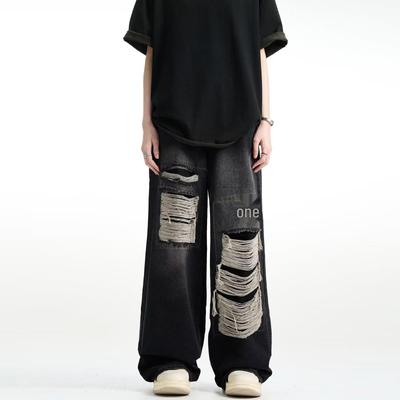 Мужские джинсы широкого кроя в стиле «американский ретро» с потертостями — летние потертости, свободный крой, модный уличный стиль.