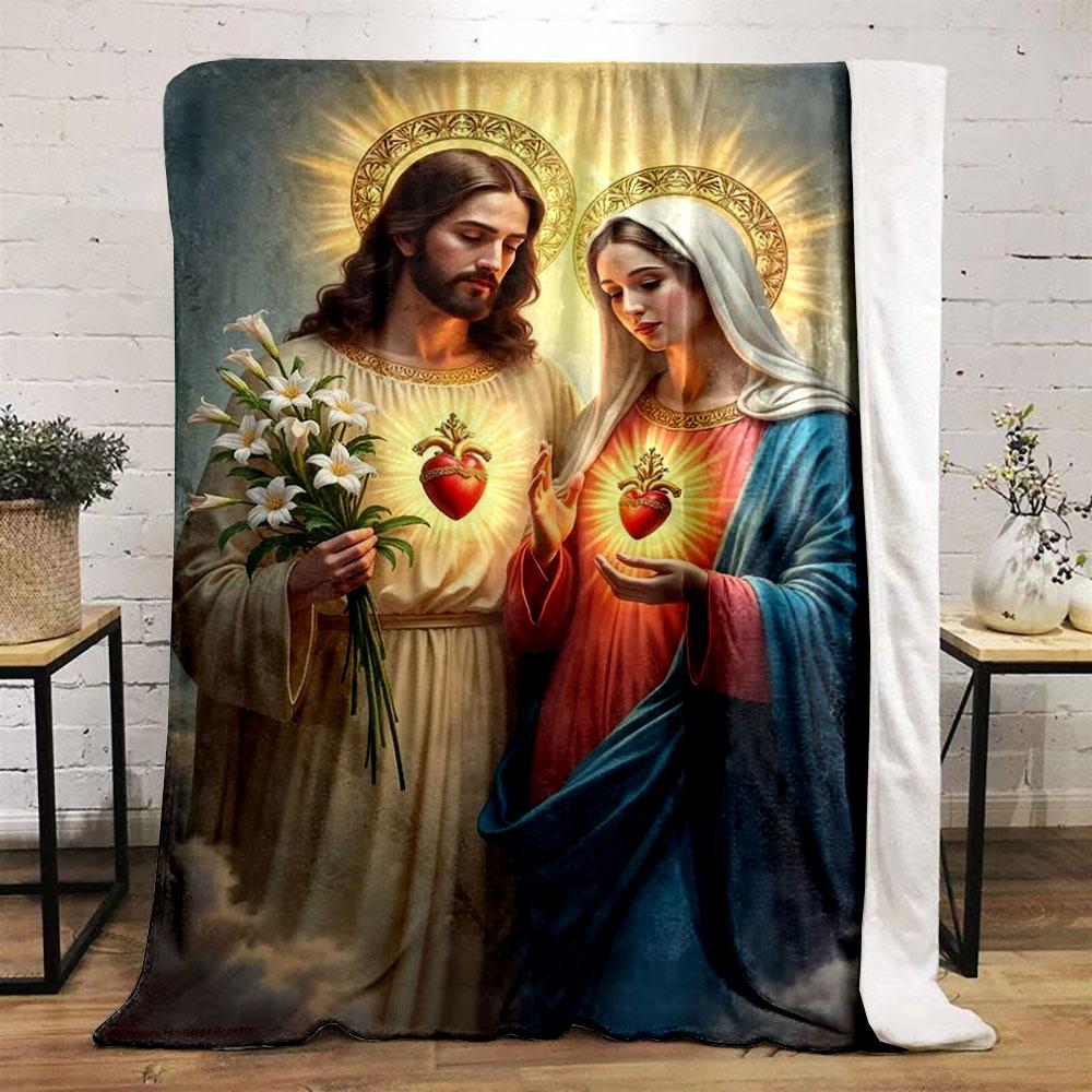 Two figures with glowing halos, sacred hearts, lilies, and radiant light. for all seasons blanket lunch break throw gift
