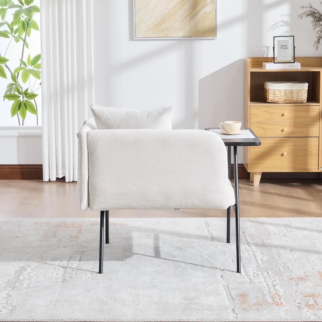 Modern single armchair with comfortable fabric backrest and two storage compartments, complemented by a practical side table.