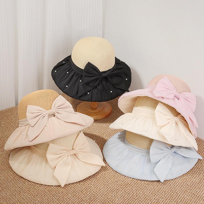 Spring and summer new women's straw hat big brim sun hat French pearl bow versatile sun protection hat travel