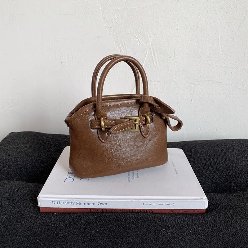 Осень и зима портативная сумка для通勤 женская новая большая вместимость на плечо сумка-тоут высококлассная сумка под мышкой тренд