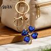 Blue Rhinestone Keychain Pendant Sparkling Rhinestones Four-Leaf Clover Design Key Chain with Electroplated Lobster Clasp Easy to Hang Holder Backpack