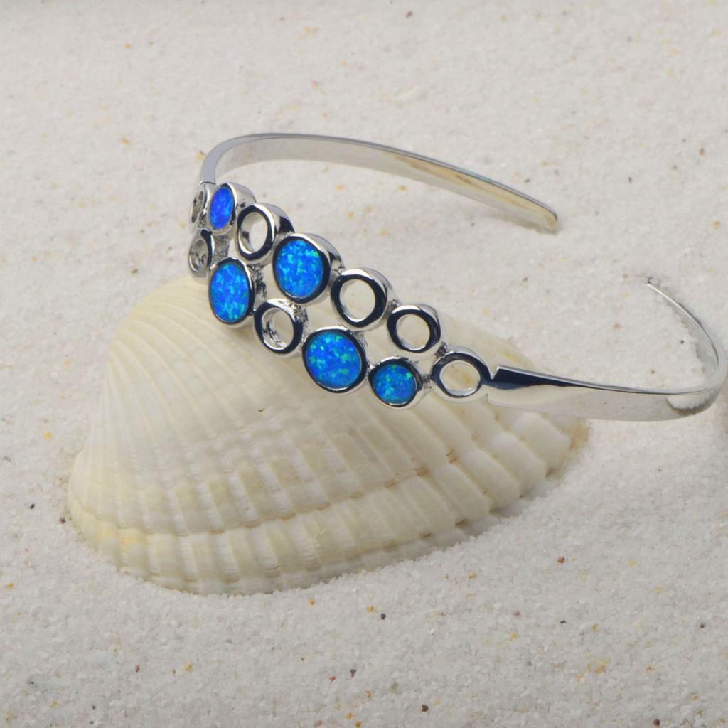 Браслет-манжета в гавайском стиле с инкрустацией опалом, ювелирное изделие