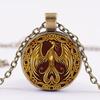 A Golden Phoenix Necklace With A Convex Glass Pendant Chain, Suitable For Both Men And Women.