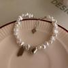 Baroque Pearl Heart Bracelet: Chic Light Luxury with Lucky Charm for a Sweet, Cool, and Elegant Look