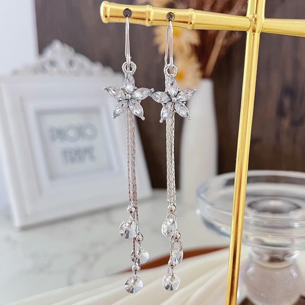 Cat's Eye Tassel Ear Chain 2024 Trend: Elegant Long Earrings with Light Luxury Design