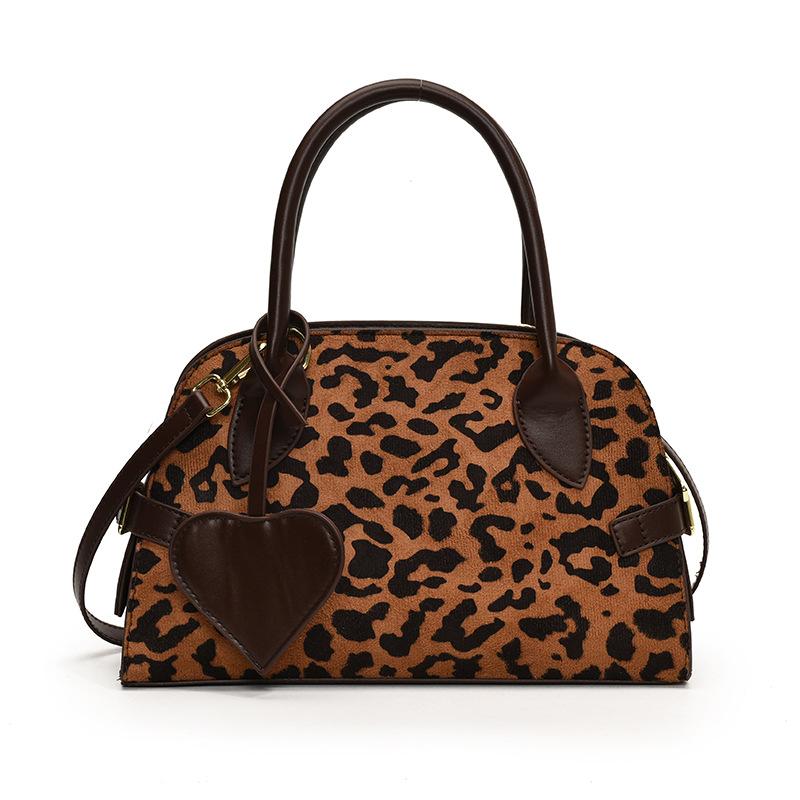 Сумка в стиле ретро с леопардовым принтом для женщин, простая и универсальная, сумка-мешок Niche Light Luxury Messenger через плечо