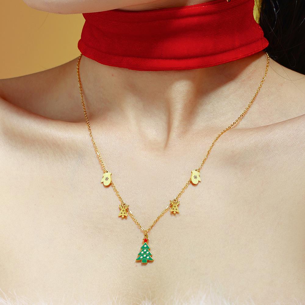 Подвеска-кулон в виде зеленого эмалированного колеса обозрения на рождественскую елку с цирконом, кисточкой в виде оленя и цепочкой из нержавеющей стали.