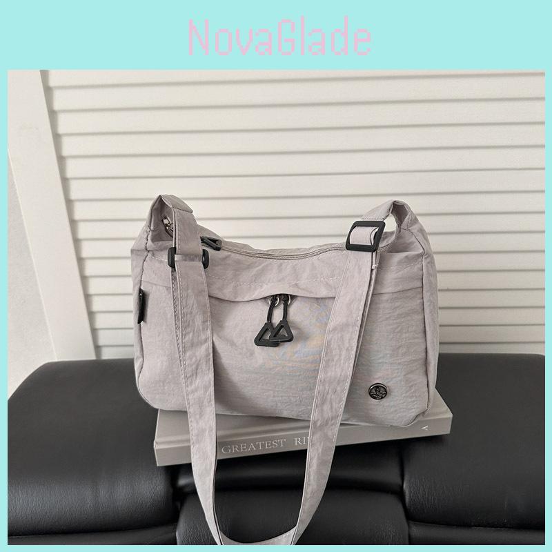 Street Style Nylon Compact Crossbody Bag With Inner Pocket For Commuting And Outings
