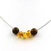Камни и минералы. Ожерелье из деревянных бусин 8 мм + настоящий балтийский янтарь. Цепочка из нержавеющей стали.
