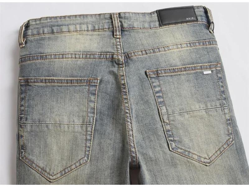 Узкие джинсы с кожаными нашивками и ретро-звездами унисекс