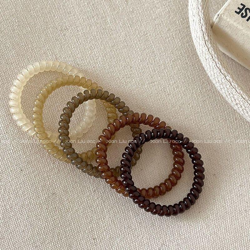Elastic Hair Ties - No-Pull, Versatile & Stylish for 2024