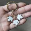С жемчужным шнурком брелок в виде кленового листа металлический брелок в виде кленового листа Сумка