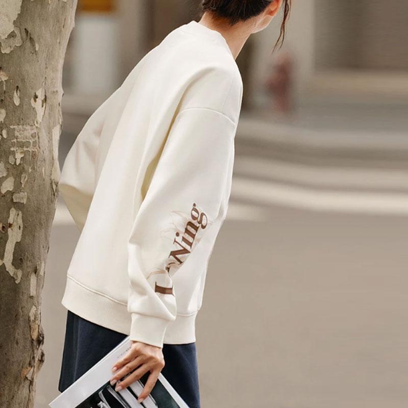 Li Ning Sports Lifestyle Series Letter Floral Fleece Теплый антибактериальный свободный пуловер Толстовка Женская толстовка Off-White AWDTE44-1