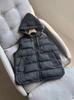 New product simple foreign style fashionable warm versatile sleeveless hooded knitted splicing hat down vest women