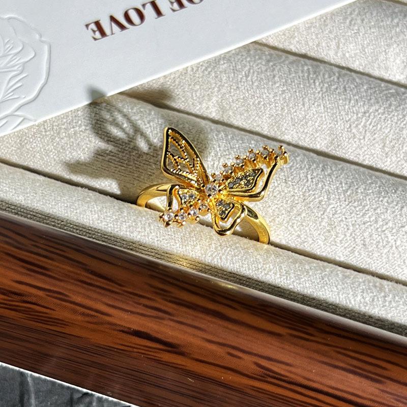Retro butterfly geometric water drop slightly inlaid court style open ring female niche design sense light luxury versatile ring tide