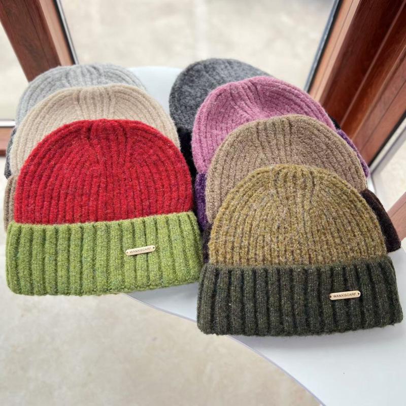 Hat women's autumn and winter new wool knitted hat thickened warm color matching couple student fashion wool hat tide