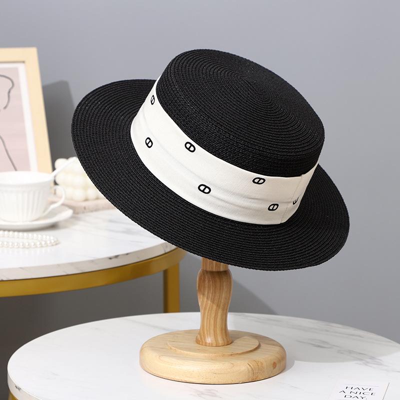 Hat women's summer sunshade sunscreen temperament flat top top hat Internet celebrity seaside Hepburn style straw beach hat