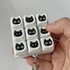 Черная кошка Fidget Keyboard 4/9 клавиш Снятие тревоги Пальцевой кликер Брелок Офис Школа Путешествия Кнопка декомпрессии Сенсорная игрушка Подвесное украшение