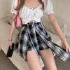 Женская черная клетчатая юбка-шорты А-силуэта 2025 года с асимметричным дизайном из двух частей