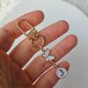 1Pc Key Logo Monogram Charm Key Fob Durability Bag Charm Lightweight Butterfly Monogram Keychain Car Key Companion Metal Keychain