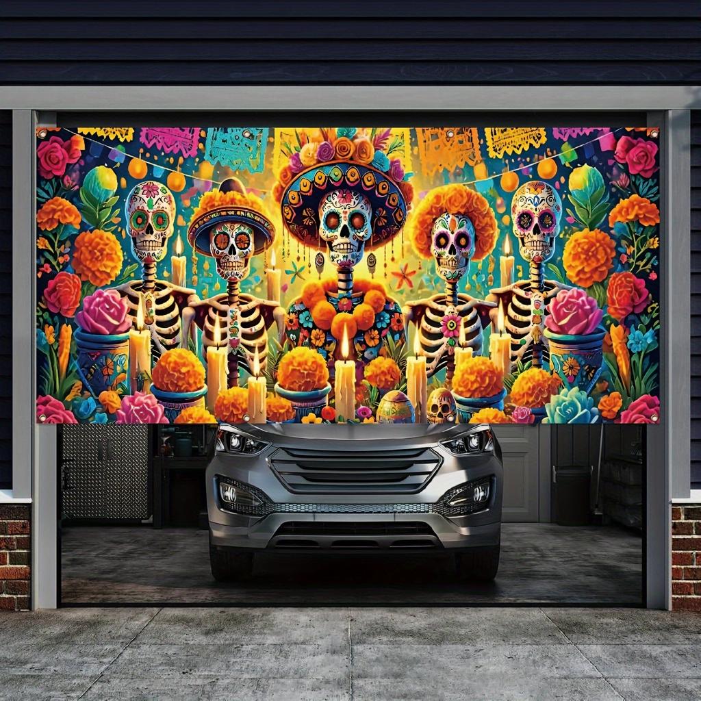 A colorful banner of Mexican Day of the Dead flowers and candles decorating a garage door.zyc