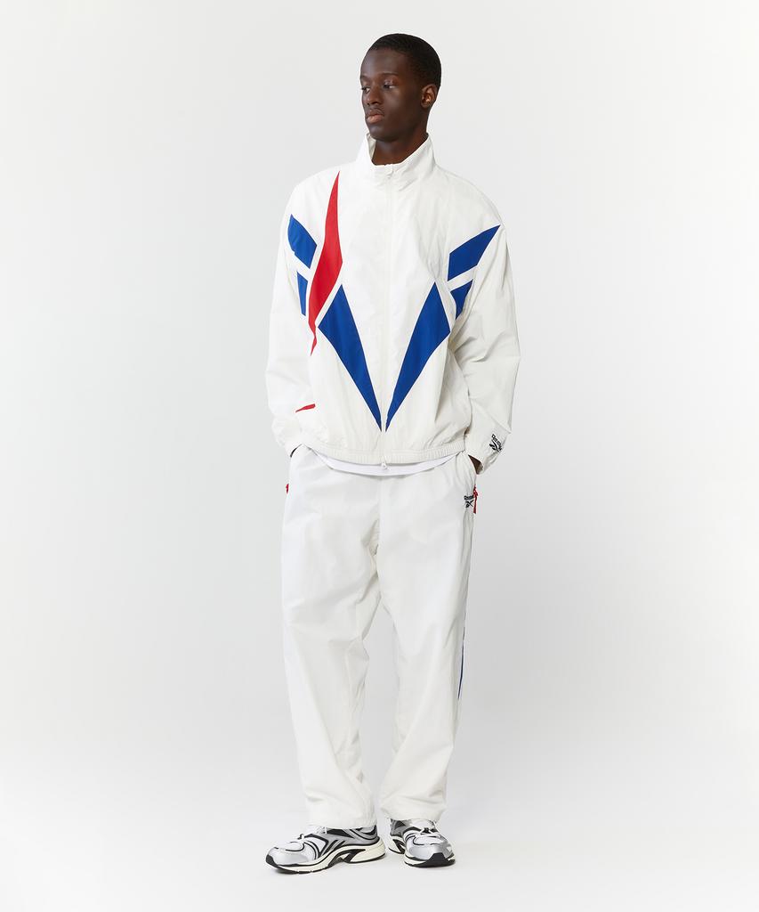 Reebok Теплые брюки Vector Flash 2-Way - Кремовый