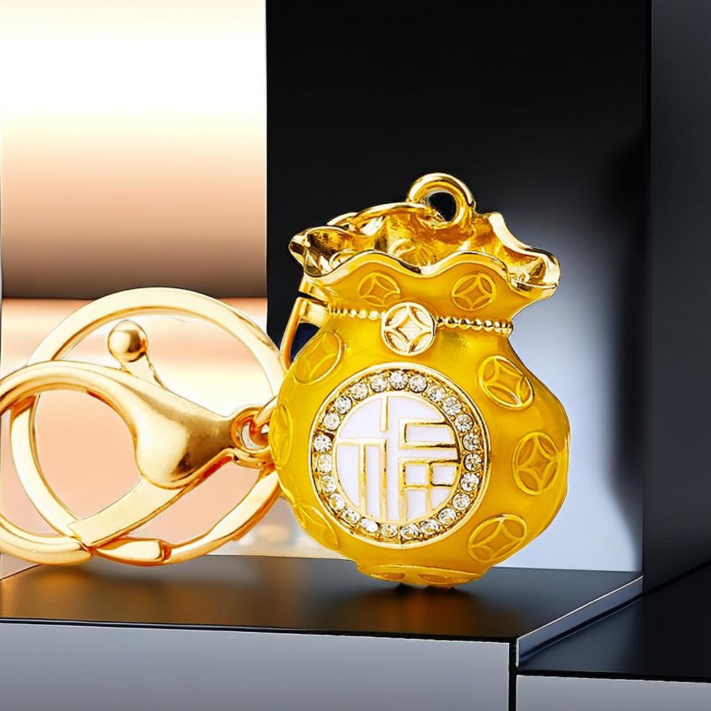 Элегантный двусторонний золотой брелок в виде мешочка удачи, идеально подходящий для бизнеса или личного использования