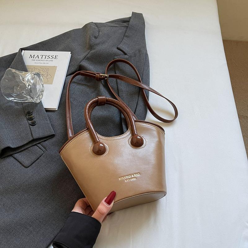 Корейская нишевая сумка женская 2025 новая весна и лето универсальная сумочка популярная одноплечевая сумка-мессенджер сумка-ведро