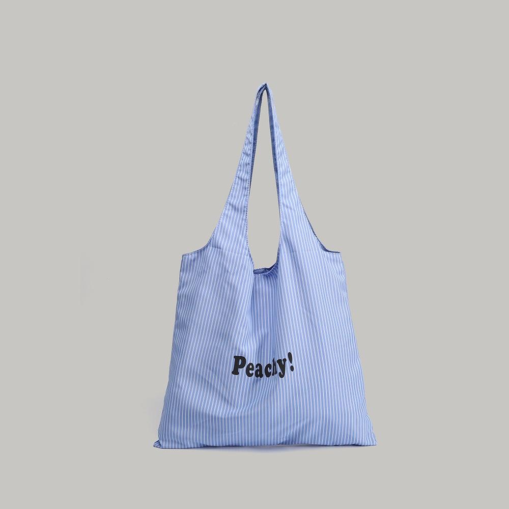 This year's popular summer new large-capacity striped underarm bag with letter print, simple and versatile shoulder bag for women