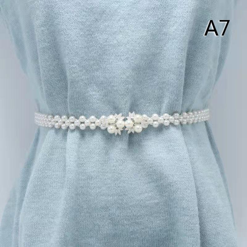 Женский эластичный пояс с большой жемчужной цепочкой на талии и универсальным бриллиантовым украшением