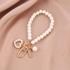Cute Pearl Keychain Luxury Women Jewelry Shiny Pearl Bead Shell Phone Bag Backpack Charm Accessory Car Key Key Chain Pendant