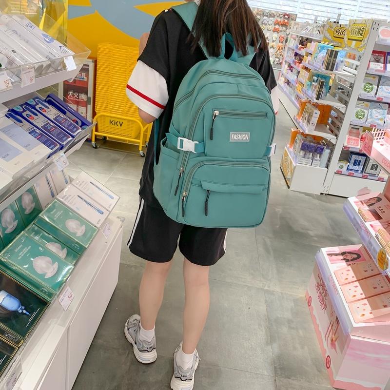 IELGY Korean Version of the Casual Large-capacity Backpack Female Simple Primary School Junior High School Student Bag