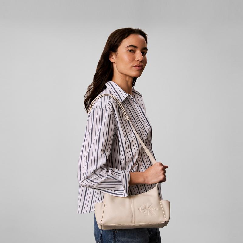 Calvin Klein Элегантная повседневная сумка через плечо с тиснением в виде букв, с множеством карманов, женская сумка, кремово-белая 4F3687G-ACG