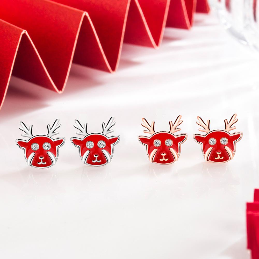 В завершение, вот вам серьги-гвоздики, маленькие посеребренные серьги, серьги в виде красных рогов.