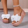 New Large Size Wedge Heel Bow One-word Slippers Women's Cloth Surface Thick-bottomed Sponge Cake Beach Cool Slippers