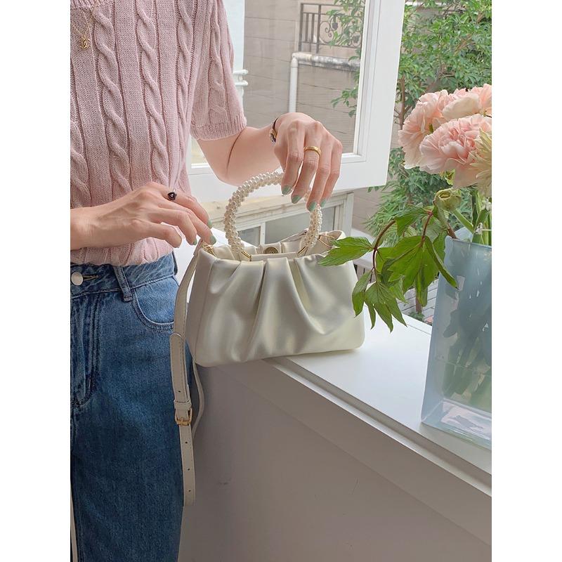Niche Новая женская сумка Temperament Pearl Wrist Fold Cloud Handbag One Shoulder Crossbody Mini Bag Trend