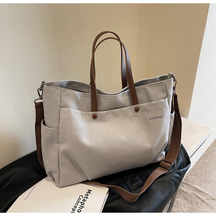 Большая вместительная повседневная сумка-тоут из холста женская сумка 2024 года новая универсальная сумка для поездок на работу простая сумка-мессенджер