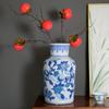 Blue & White Hand-Painted Porcelain Vase: Elegant Ceramic Ornament for Living Room or Entryway.