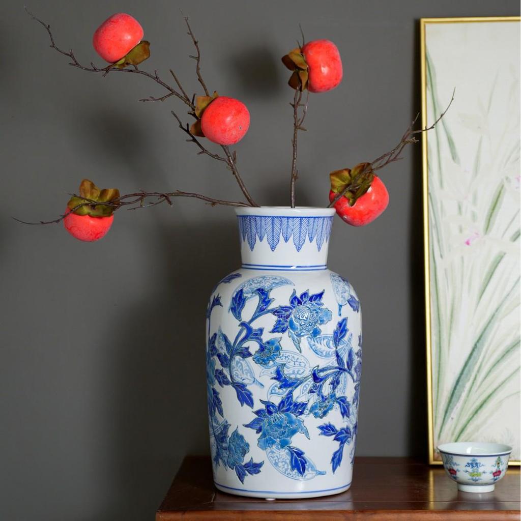 Blue & White Hand-Painted Porcelain Vase: Elegant Ceramic Ornament for Living Room or Entryway.