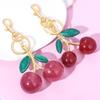 12 роскошных брелоков Cherry: Креативные подвески в виде сумки с имитацией фруктов и блестками из кристаллов для женщин