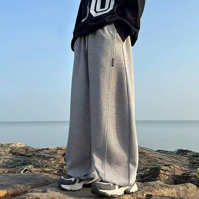 Мальчиковые брюки Весна и Осень 2025 Новые детские осенние спортивные брюки Осенние спортивные штаны для больших мальчиков Стильные брюки широкого кроя Модные