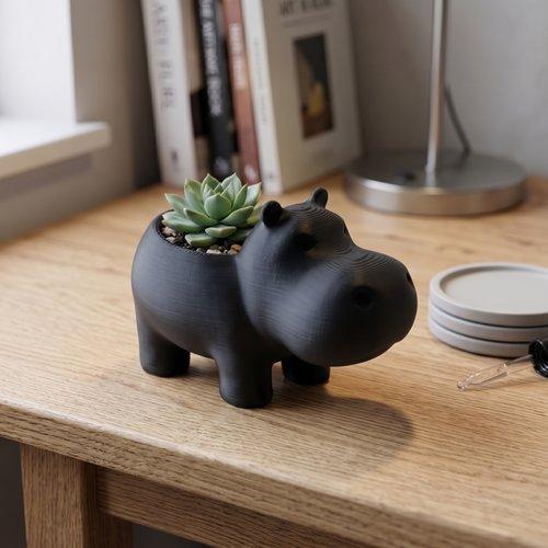 Black hippopotamus-shaped flowerpot for succulents and flowers