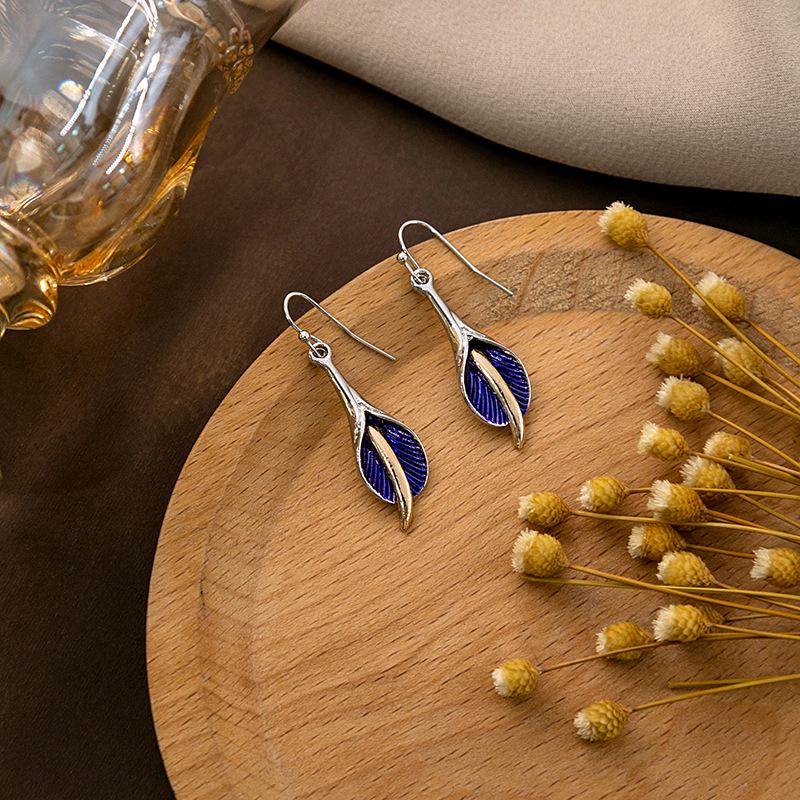 "European & American Retro Turquoise Feather Earrings: Bohemian Dragonfly, Bird, Water Drop, Round, & Pearl Designs"